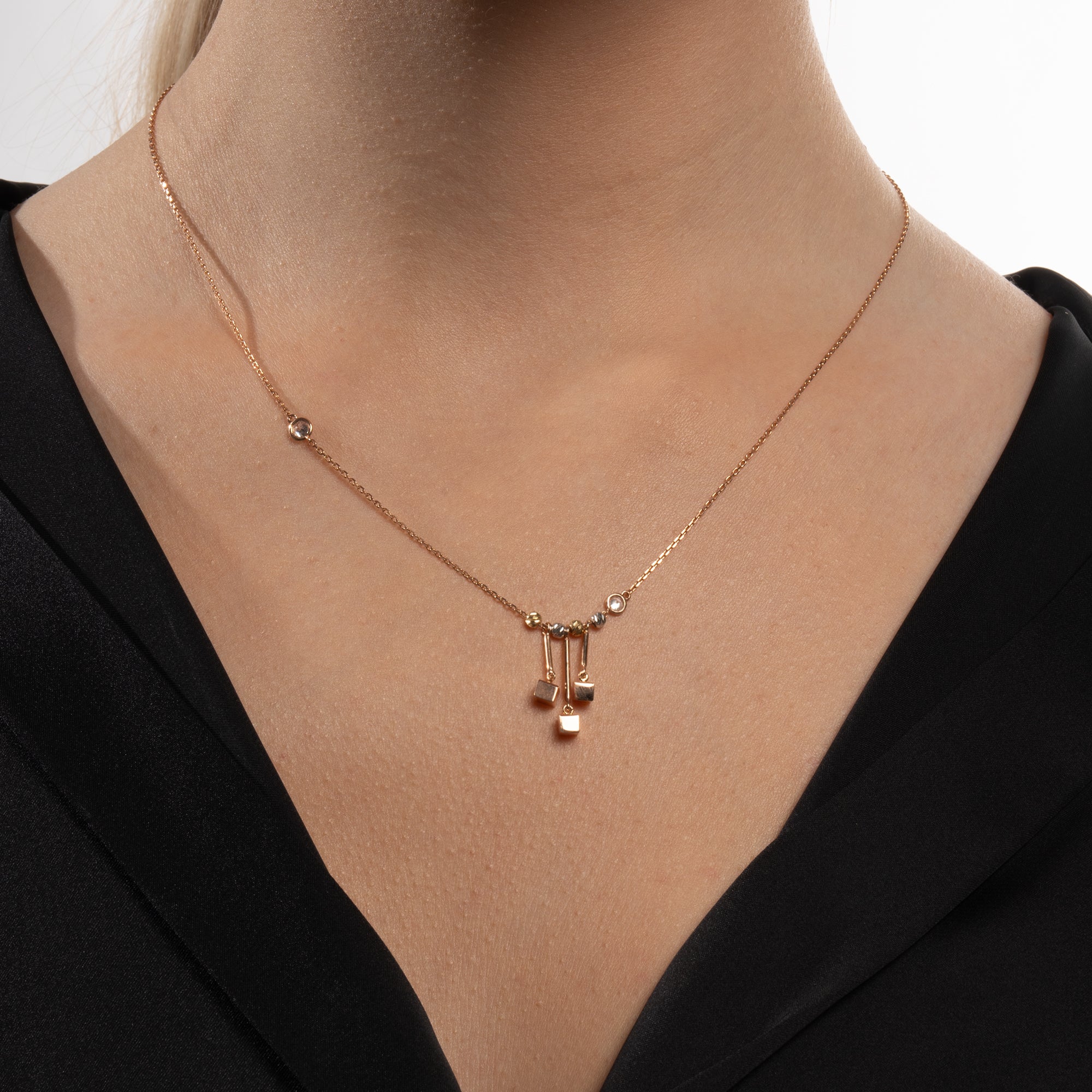 Gold Necklace with Three Cube Detailed Dorika Ball