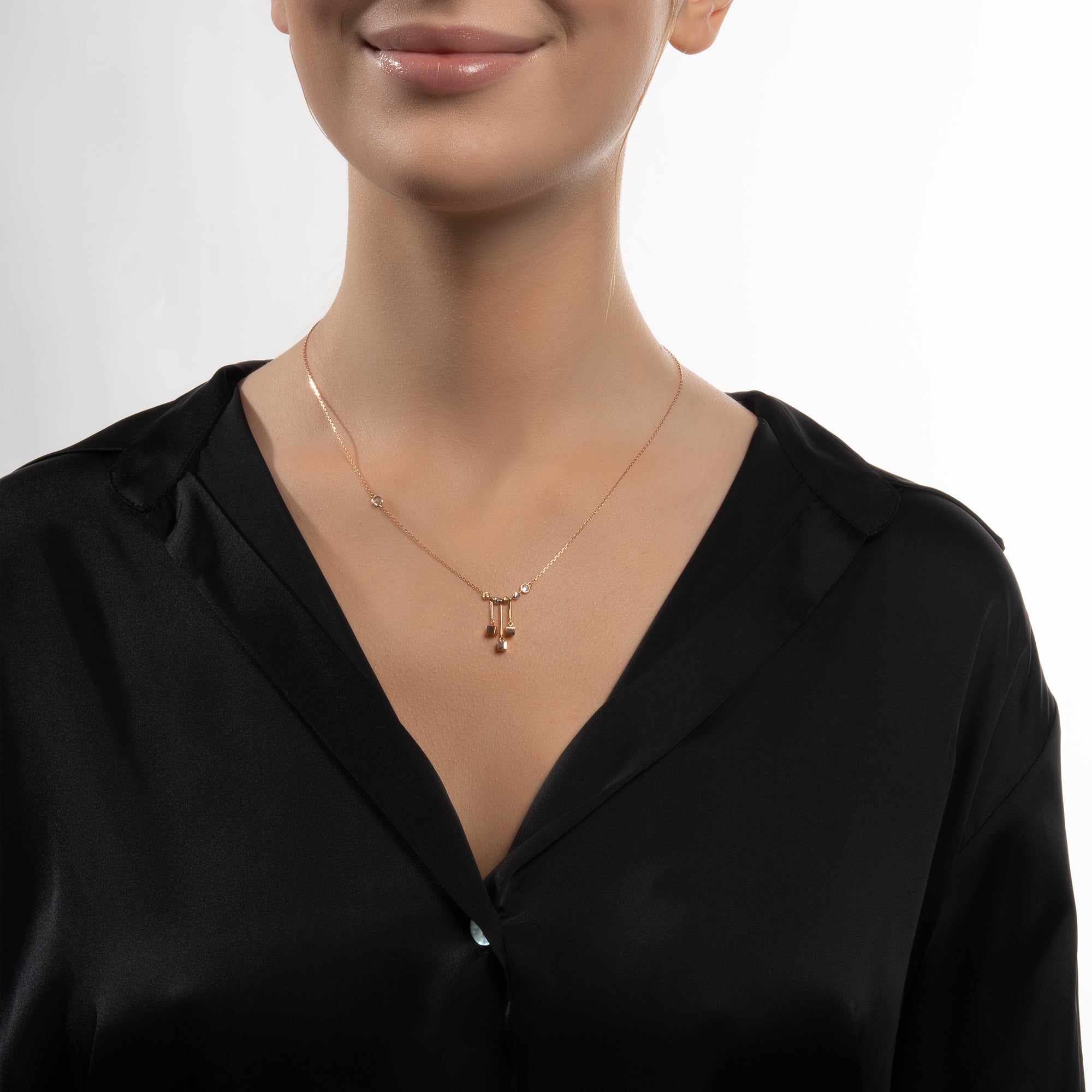 Gold Necklace with Three Cube Detailed Dorika Ball