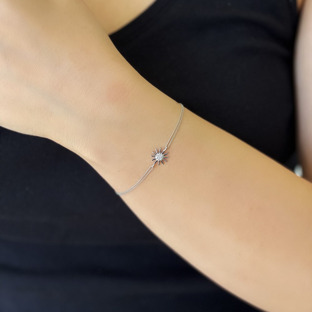 White Bracelet with Sun Design